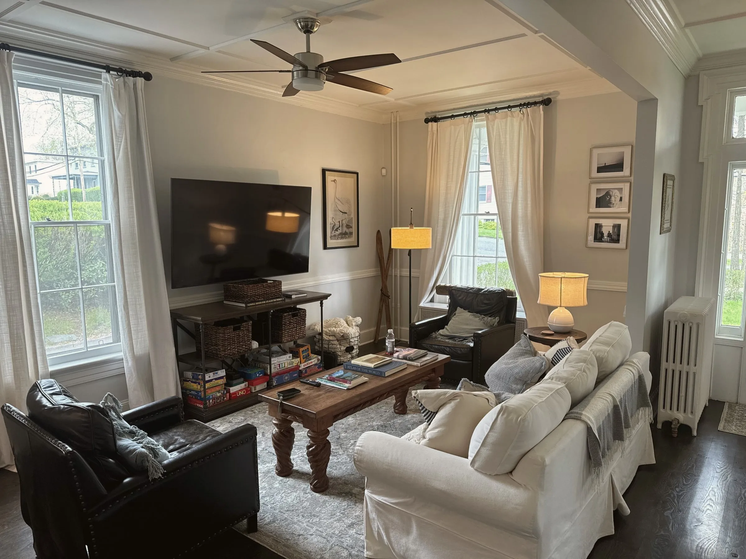 The family room off the kitchen with a large TV